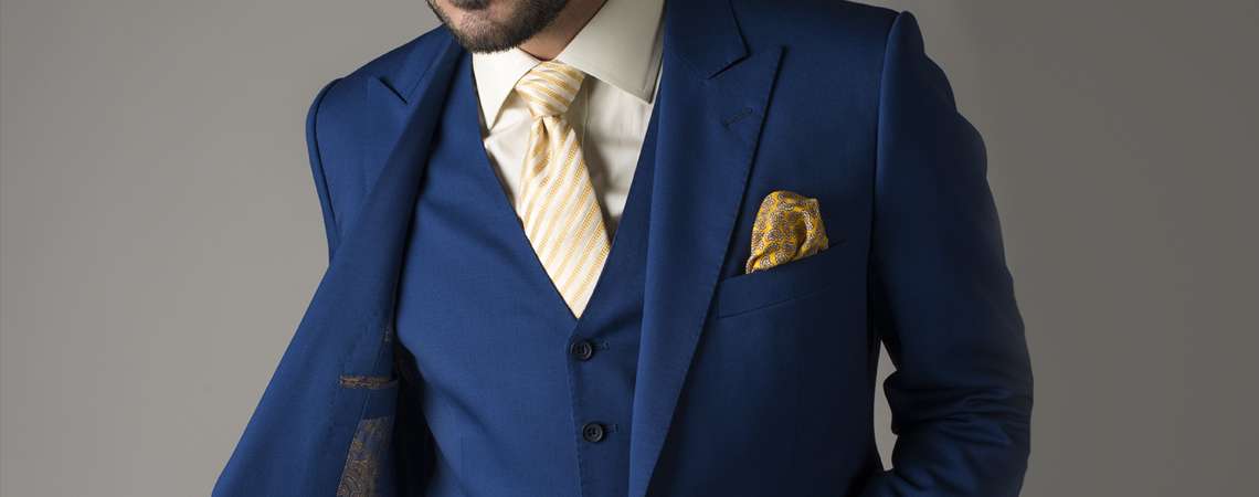 Apsley Bespoke Tailors in Hong-Kong Specialize in Making Bespoke Navy Blue Suits